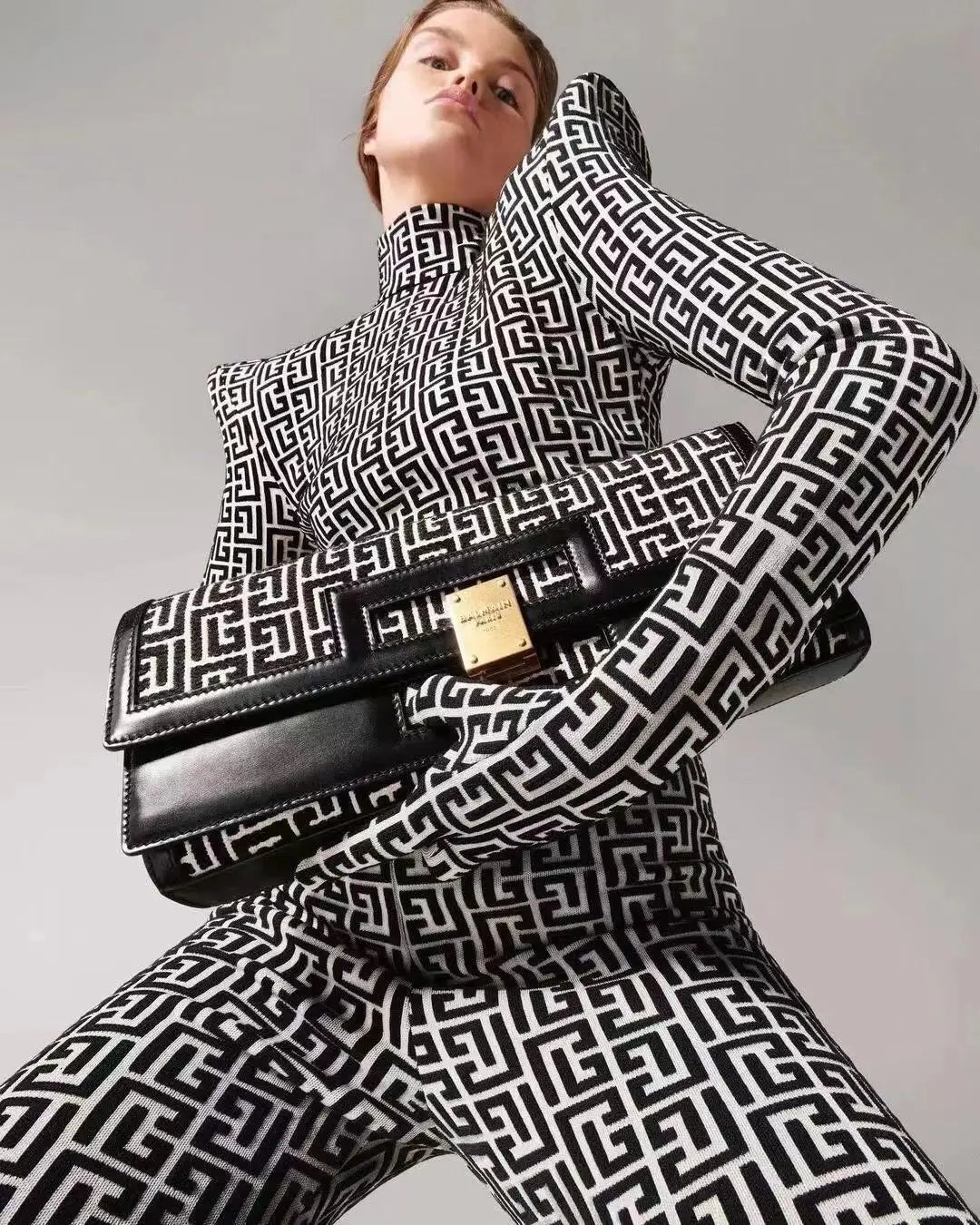 Geometric Knit Bandage Jumpsuit with Structured Shoulders